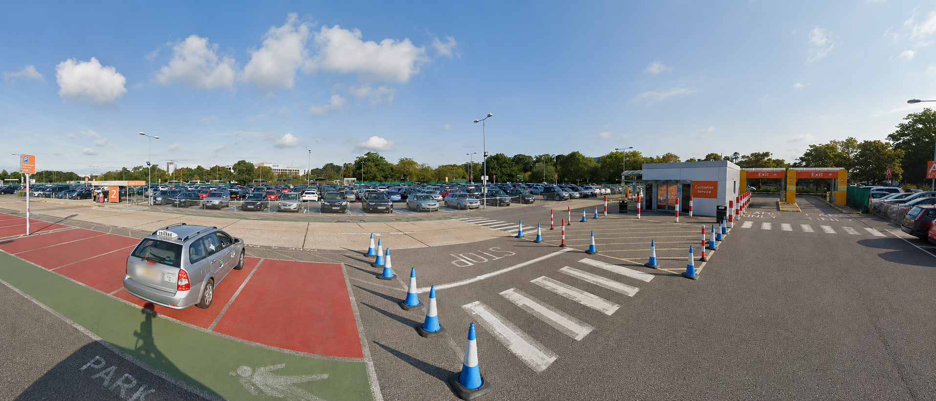 Gatwick Airport Long Stay car park customer service building and pedestrian crossing collection area
