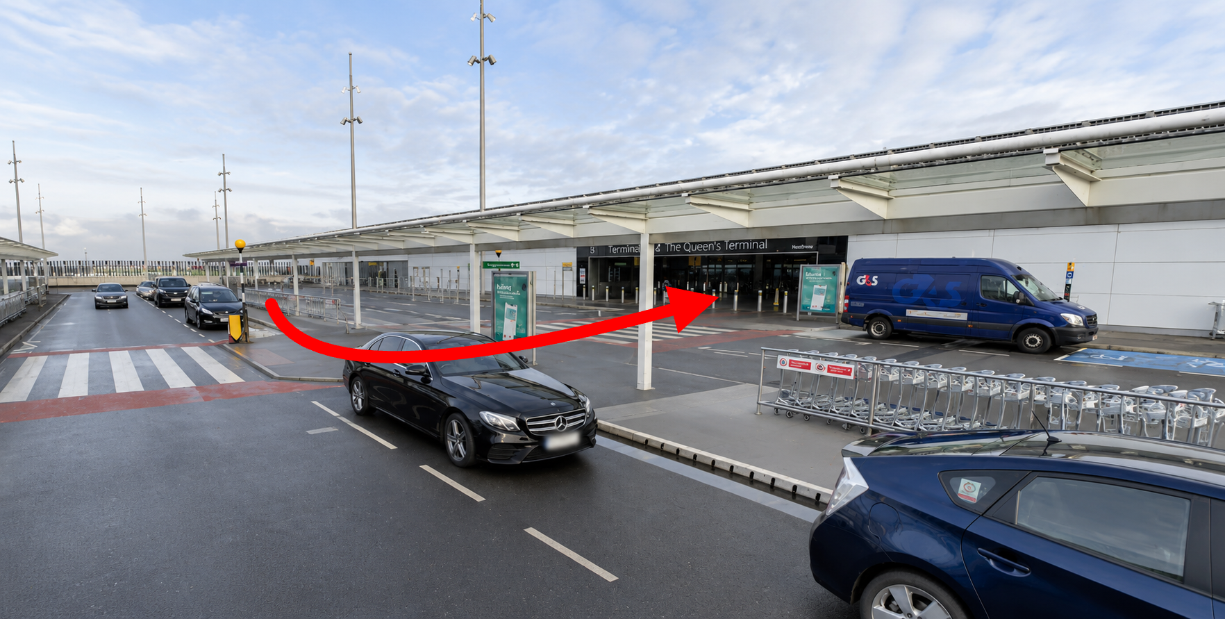 Annotated route arrow along Clipper Road toward the London Heathrow Airport Terminal 2 main entrance doors